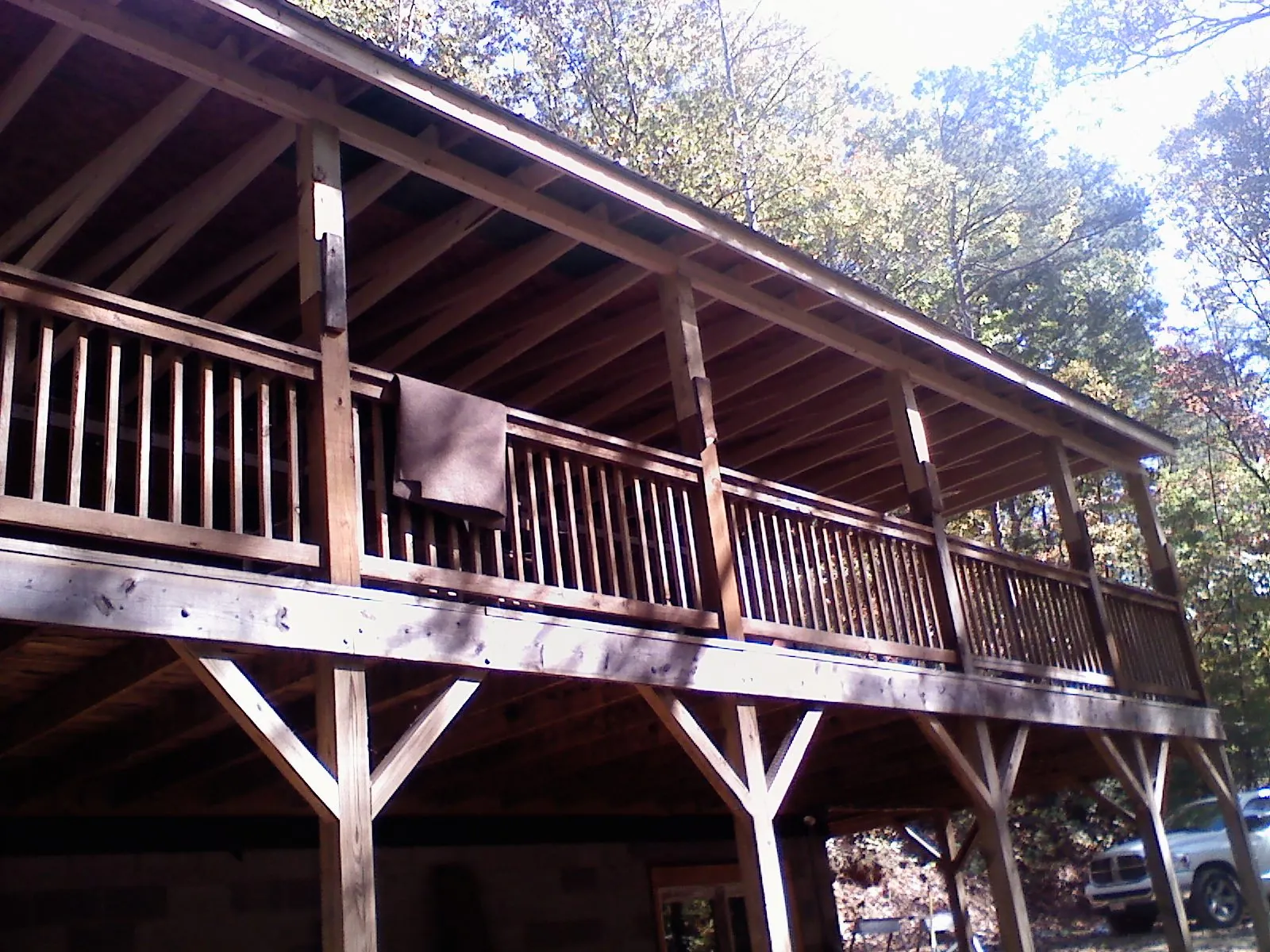 Timber framing under a new elevated porch and deck — Roof Leak Repair in Nixa by Roofing Brothers
